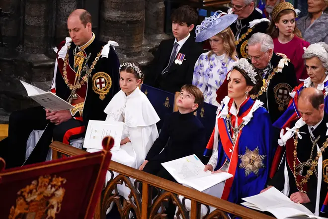 Britain's Prince William, Prince of Wales, Princess Charlotte, Prince Louis and Britain's Catherine, Princess of Wales attend the coronations of Britain's King Charles III and Britain's Camilla, Queen Consort at Westminster Abbey