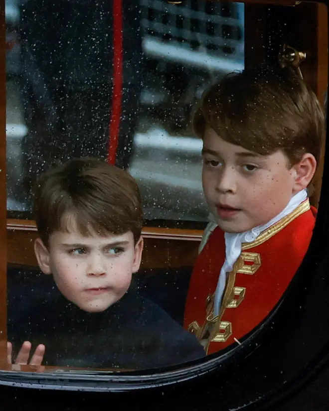 Britain's Prince Louis of Wales (L) and his brother Britain's Prince George of Wales