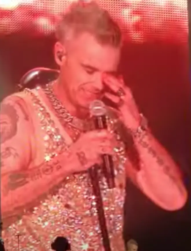 Robbie had just performed 'Land of 1000 Dances' when he stopped his band from launching into the next song.