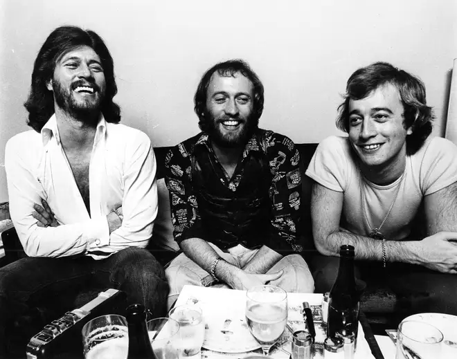 The Bee Gees: brothers Barry, Maurice, and Robin in 1975. (Photo Gijsbert Hanekroot)