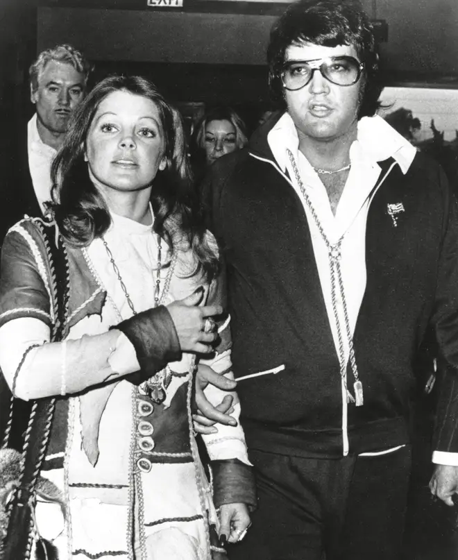 Elvis and his wife Priscilla leaving the courthouse hand-in-hand following their divorce in 1973. (THA File Reference # 34408-056THA)