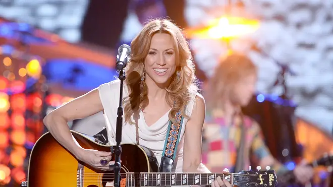 Sheryl Crow performing at the 2013 American Country Awards