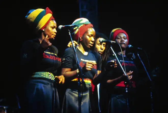 Bob Marley performing live on stage with wife Rita and the I-Threes. (Judy Mowatt, Rita Marley & Marcia Griffiths)  (Photo by Graham Wiltshire/Redferns)