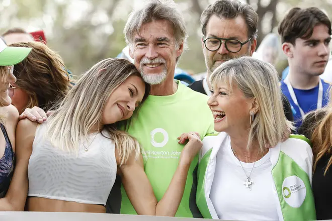 Chloe Lattanzi is gearing up for the one year anniversary of her mother's death. Pictured L to R: Chloe, her step father John Easterling and Olivia Newton-John.