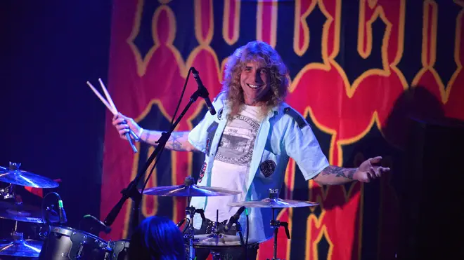 Steven Adler performing in 2018