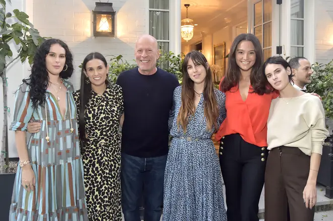 Despite Demi and Bruce Willis' friendship has endured and the pair continue to co-parent their three daughters: Tallulah, Scout, and Rumer Willis. (Pictured L to R: Rumer Willis, Demi Moore, Bruce Willis, Scout Willis, Emma Heming and Tallulah Willis)