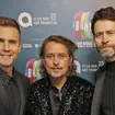 Take That has hinted at a reunion via the the band's official Instagram page (Pictured L to R: Gary Barlow, Mark Owen and Howard Donald)