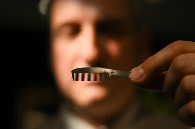 Even Freddie's moustache comb was up for sale. (Photo by Daniel LEAL / AFP) (Photo by DANIEL LEAL/AFP via Getty Images)