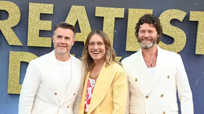 The three-piece Take That at the premiere of their Greatest Day film in June 2023