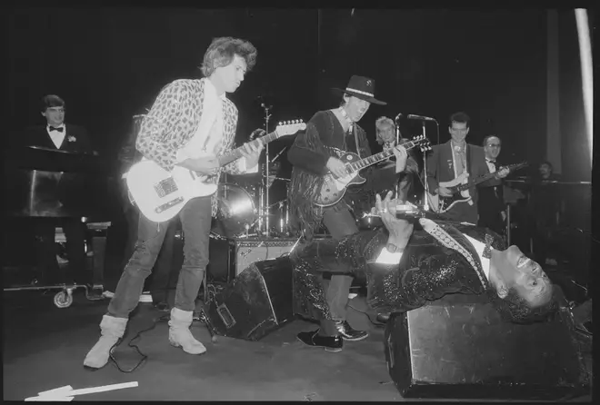 Keith Richards, Neil Young and Chuck Berry performing at the first ever Rock and Roll Hall of Fame induction ceremony in 1986. (Photo by Nick Elgar/Corbis/VCG via Getty Images)