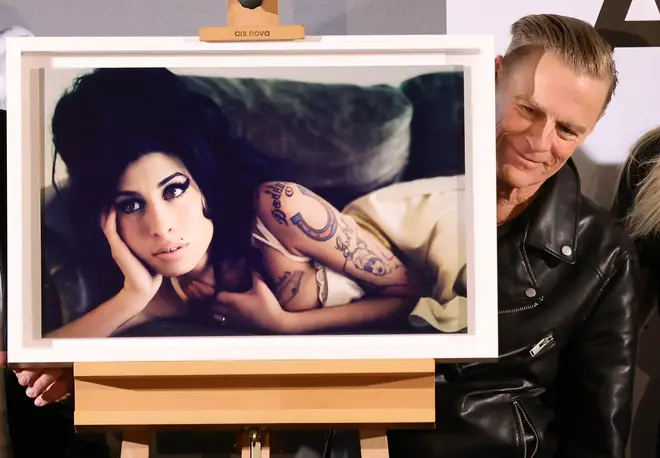 Adams, 63, started life as a photographer in the '90s and is widely respected in the industry, having shot such greats as has Mick Jagger, Amy Winehouse (pictured) and Kate Moss during his illustrious career.