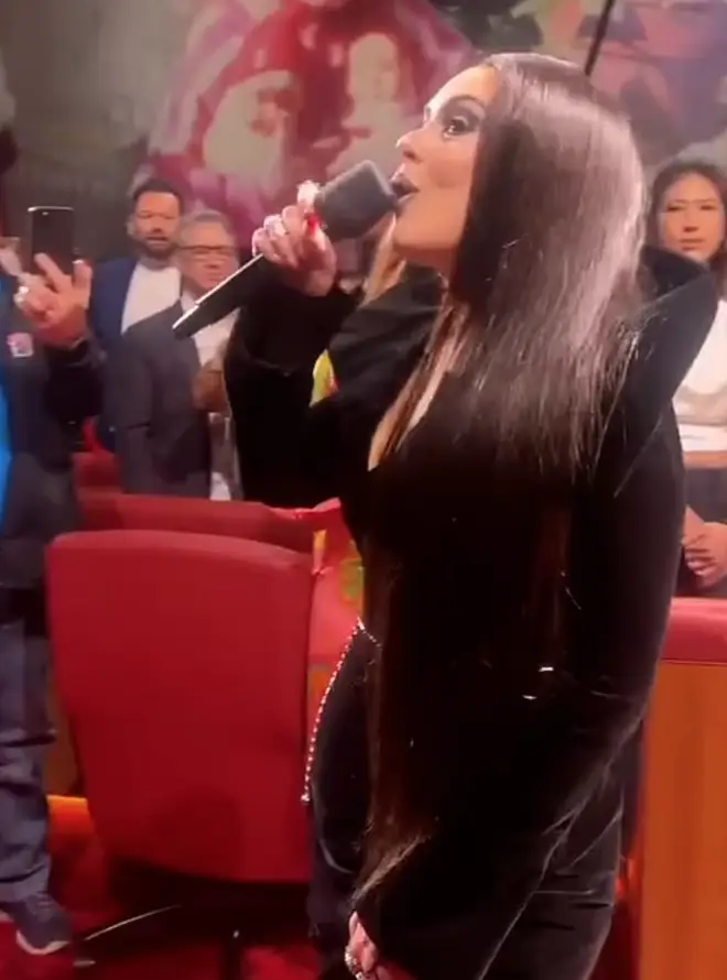 The 35-year-old singer, dressed as Morticia Addams for a Halloween-themed performance, was in the midst of singing 'When We Were Young' from her album 25.