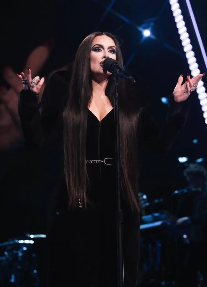 Adele was dressed as Morticia Adams for the Halloween show (pictured)