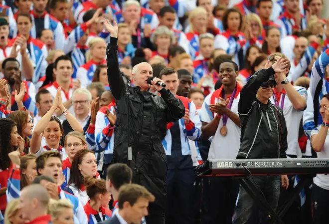 Neil Tennant (pictured) performing during the 2012 Olympic Team GB celebration parade.