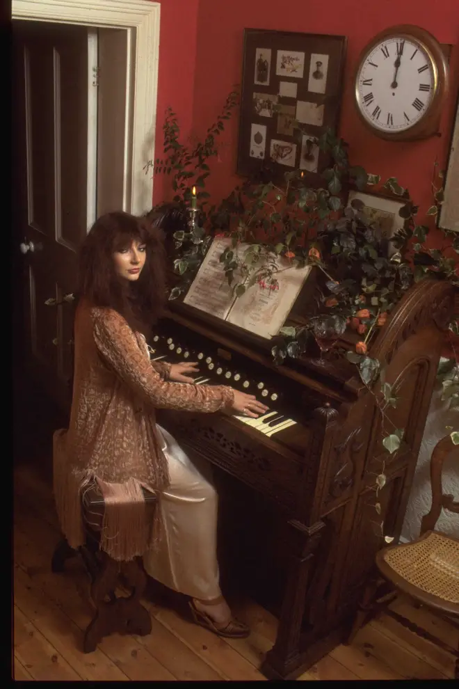 Musician Kate Bush posed at a piano in promotion of her one-off Christmas television special, Kate, circa 1979. (Photo by TV Times via Getty Images)