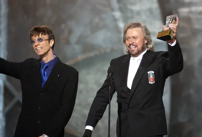 Robin Gibb and Barry Gibb accept the Legends Award at the 45th Annual GRAMMY Awards
