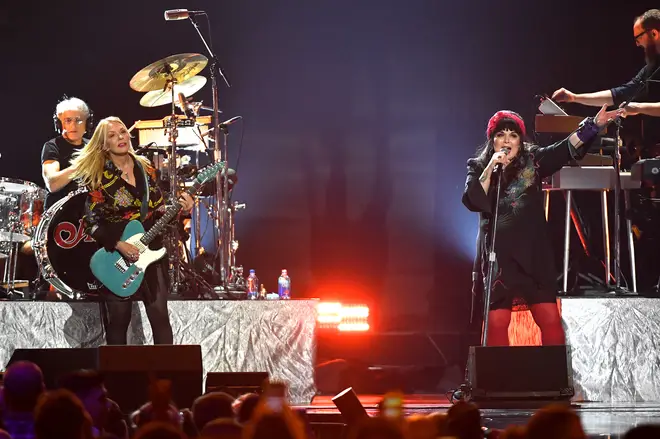 Heart's Nancy Wilson (left) and Ann Wilson (right) on stage together in 2019. (Photo by Ethan Miller/Getty Images)