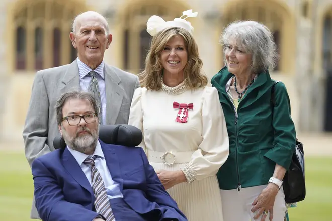 Kate Garraway, with her husband Derek Draper and her parents Gordon and Marilyn Garraway, after being made a Member of the Order of the British Empire for her services to broadcasting, journalism and charity by the Prince of Wales