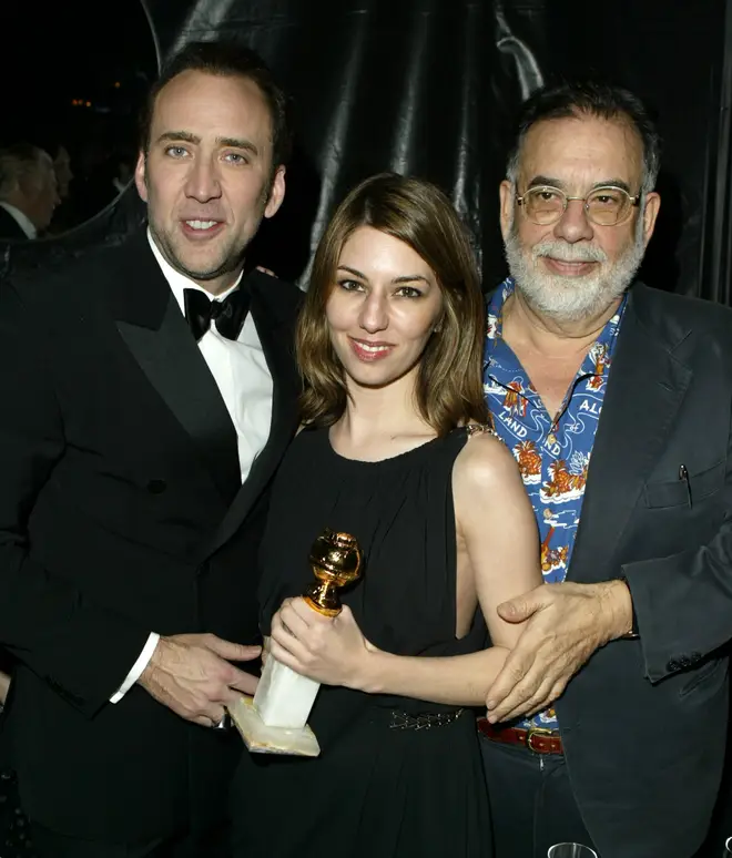 Nicolas Cage with his cousin Sofia Coppola and uncle Francis Ford Coppola. (Photo by Jeff Vespa Archive/WireImage)