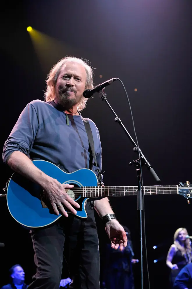 The footage, taken during Barry Gibb's first tour without any of his three brothers, shows the Bee Gee taking to the stage to sing 'Stayin' Alive' in honour of his siblings.