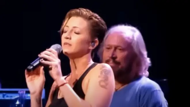 The 1977 song, performed orginally as a trio with Robin and Maurice Gibb, is given a unique makeover by Barry, Samantha and Stephen Gibb in a the beautiful moment captured by an onlooker.