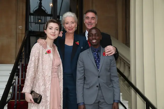 Emma Thompson received her damehood with husband Greg, daughter Gaia, and son Tindy by her side. (Photo by Steve Parsons - WPA Pool/Getty Images)