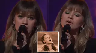 Watch Kelly Clarkson stun the audience on her talk show with a beautiful rendition of Judy Garland's 'Over The Rainbow'.