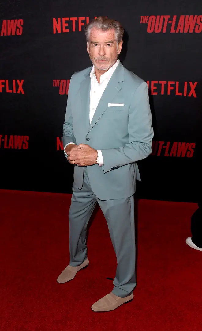 We're used to seeing Pierce Brosnan looking suave in suits. (Photo by Albert L. Ortega/Getty Images)