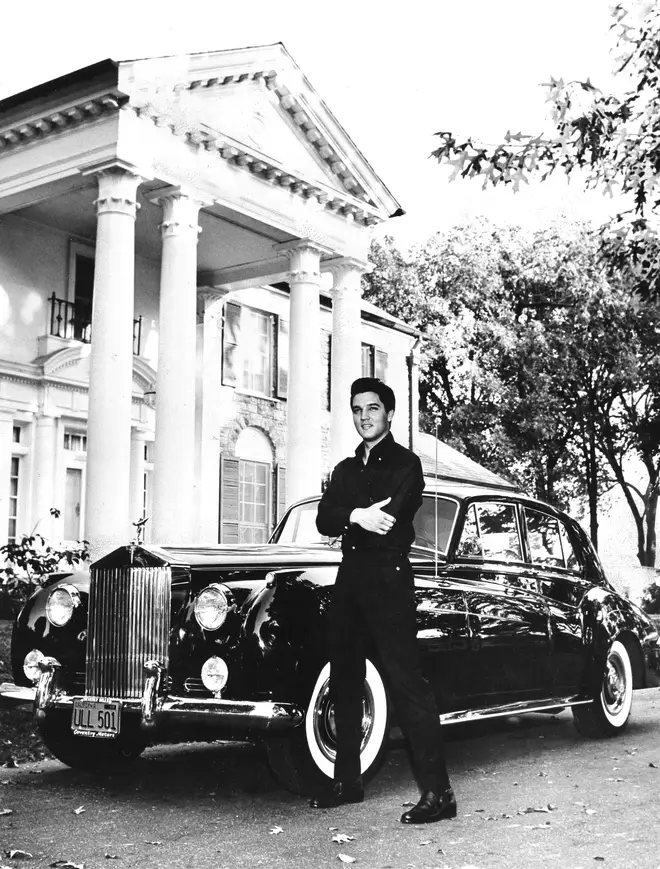 Elvis Presley outside his Graceland home