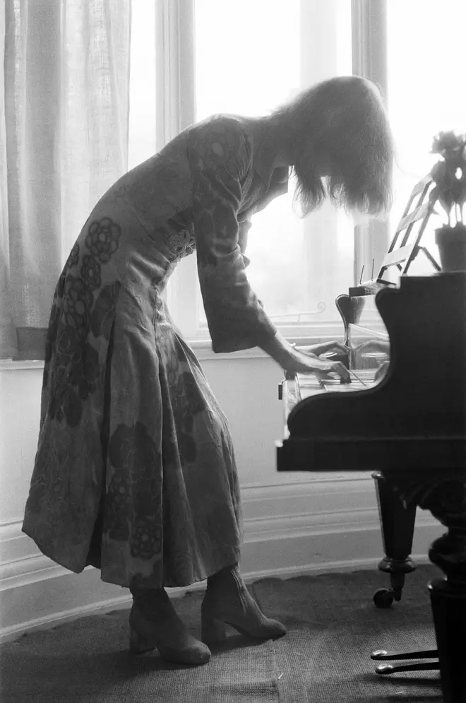 David Bowie plays the piano at Haddon Hall, Kent in 1971