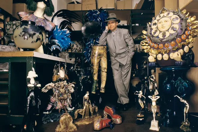 Elton John puts the contents of his home under auction at Sotheby's, London, 1988.