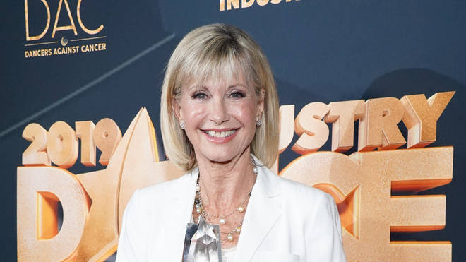 Olivia Newton-John stuns on the red carpet as singer gives new cancer update