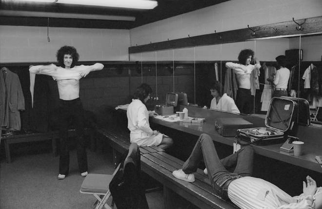 Brian May and Freddie Mercury relaxing backstage during the band's US tour, January 1977.