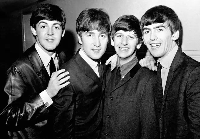 The Beatles photographed in 1965 around the time they met Elvis Presley