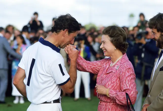 Prince Charles and the Queen pictures at a polo match in July 1985