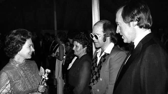 The Queen speaking to Sir Elton John at her Silver Jubilee