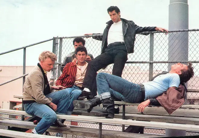John Travolta as Danny in Grease along with the T-Birds